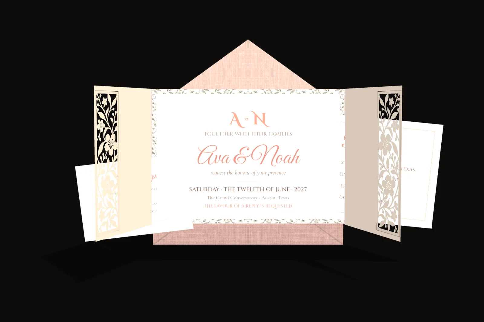 An invitation suite fanned out in a hand